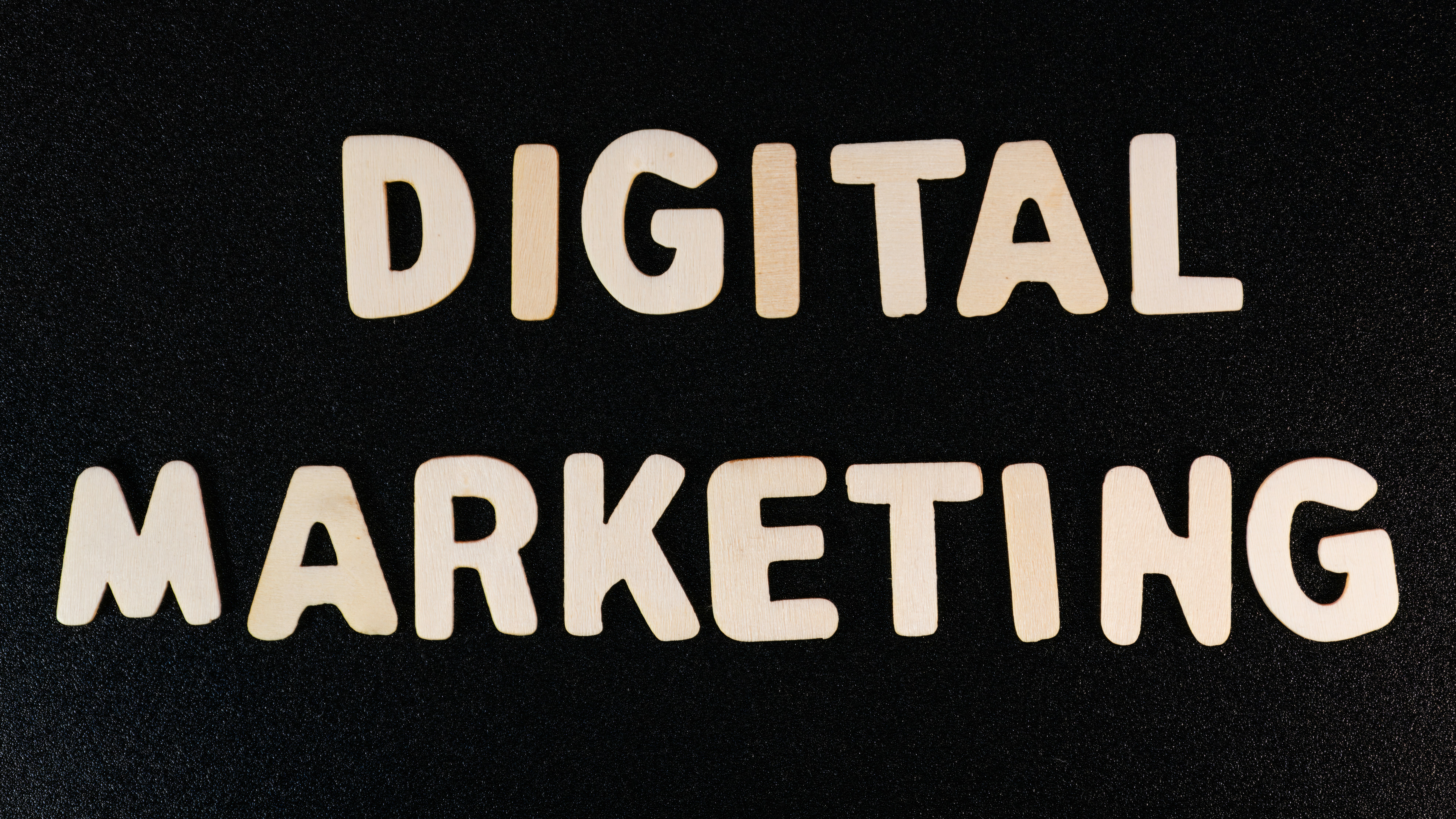 the words digital marketing written in white type on a black background